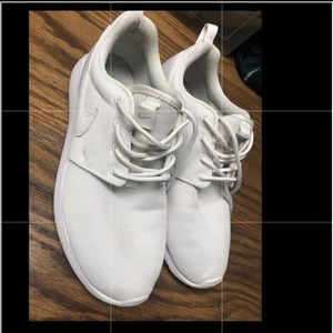 Solid white Nike Roshes